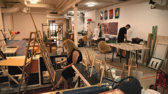 Artists working in an art workshop.
