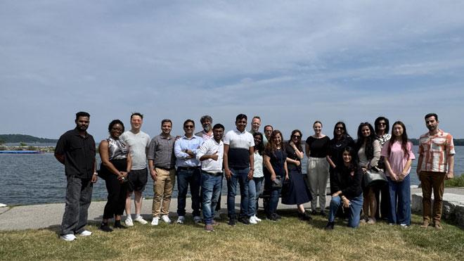 Group of business people visiting the waterfront