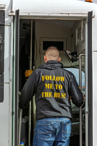Tim Carlson Walking onto Bus